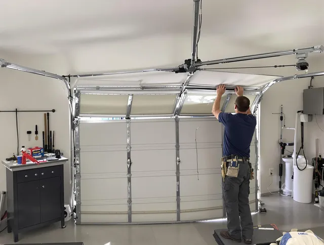 Florence-Graham Garage Door Repair specialist performing precise section replacement on Florence-Graham garage door