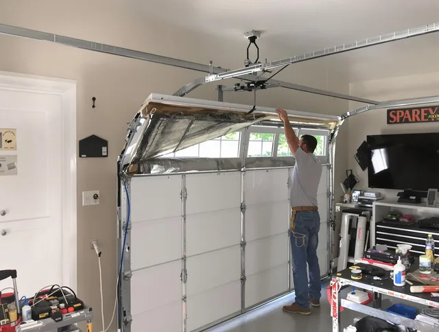 Garage door section replacement by Florence-Graham Garage Door Repair in Florence-Graham