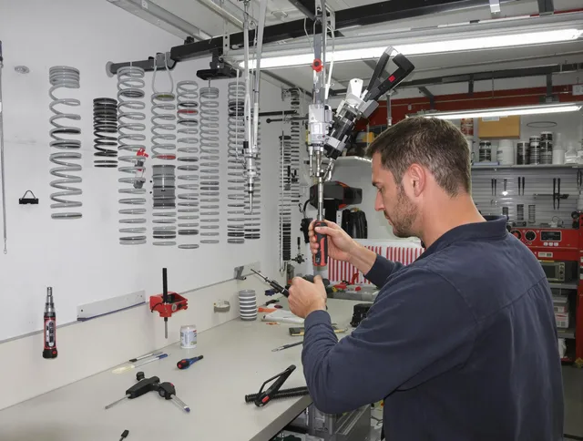 Florence-Graham Garage Door Repair safety certified technician performing precision spring replacement in Florence-Graham
