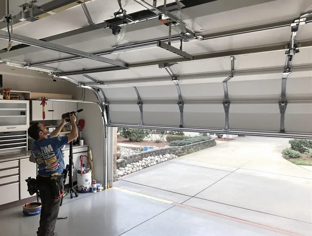 Garage door track repair service by Florence-Graham Garage Door Repair in Florence-Graham